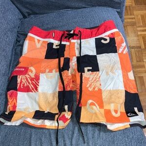Quiksilver Men's Red and Orange Checkered Swim Shorts